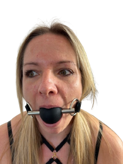 Black ball gag on leather strap for BDSM restraint play