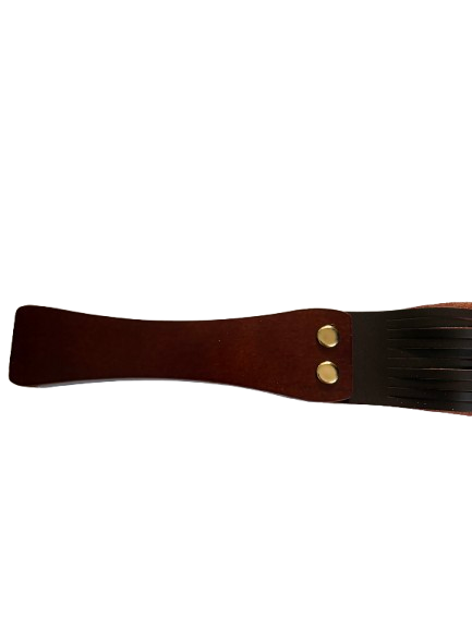 Wooden handle of leather flogger showing grain and finish detail