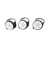 Load image into Gallery viewer, Three small round black candle tins with white labels arranged on a plain white background.